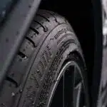 black and gray wheel with tire