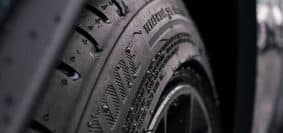 black and gray wheel with tire