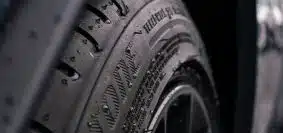 black and gray wheel with tire