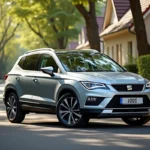 SEAT Ateca familial garé dans un quartier résidentiel calme, vue 3/4 avant mettant en valeur son espace et son design moderne