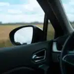 black car side mirror during daytime
